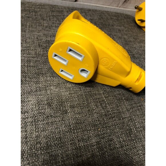 Camco 55185 Power Grip Dogbone Electrical Adapter 30 Amp Male to 50 Amp Female - Picture 4 of 6